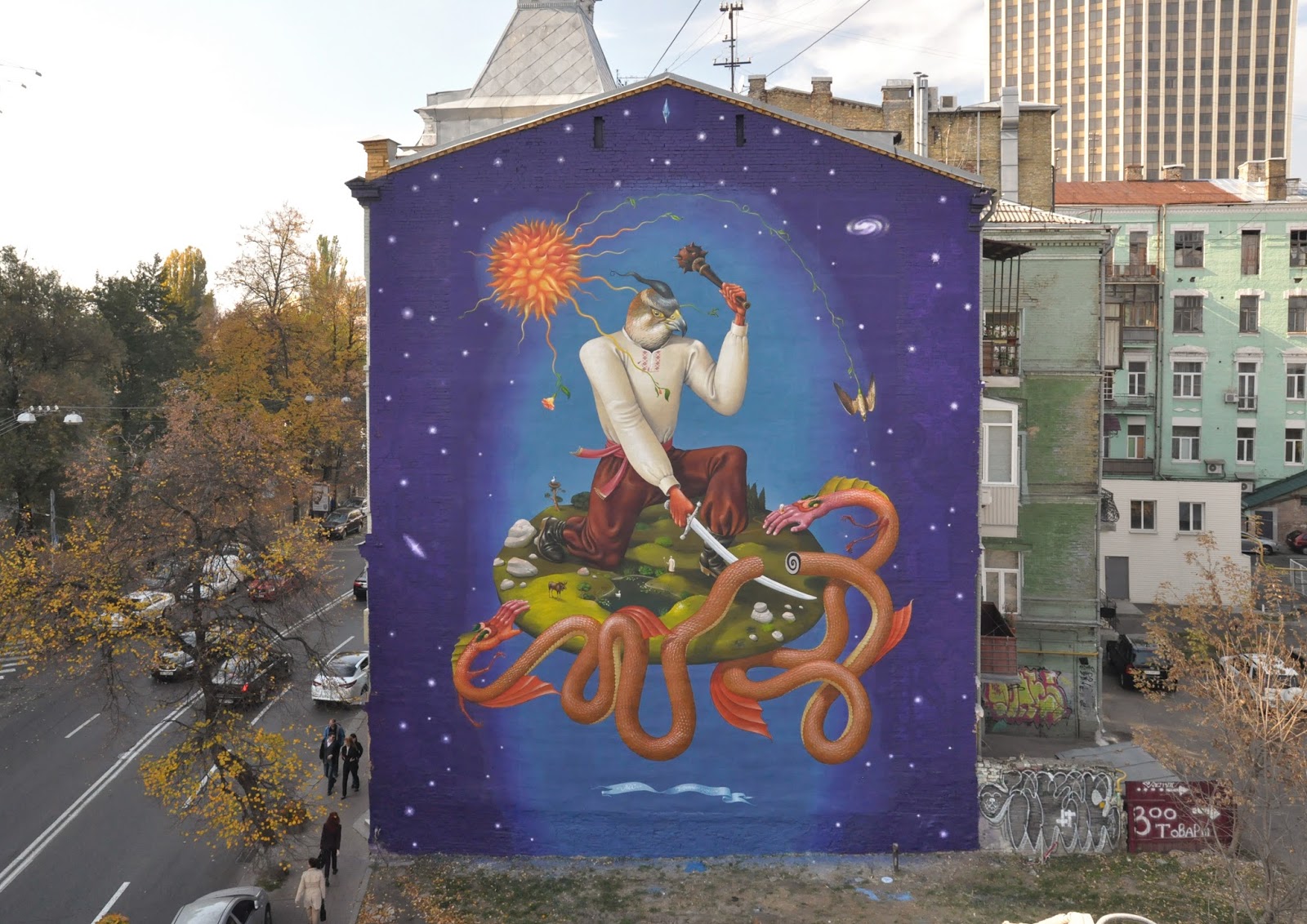 В Киеве уличный художник украсил стены муралом, посвященным событиям в Украине
